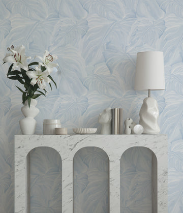 Hamptons Monstera in Light Blue Wallpaper from Olive et Oriel where you can shop wallpaper and artworks online