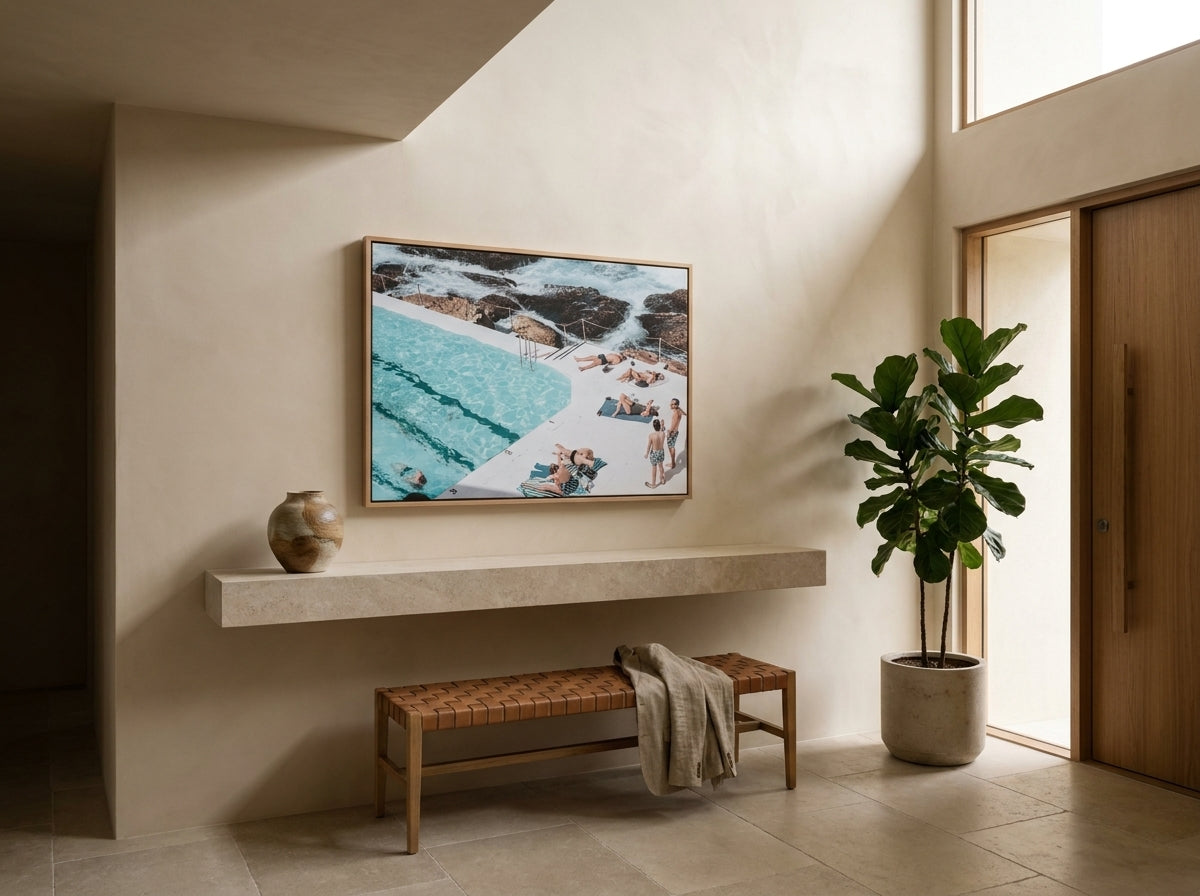 Sunbathers Sydney Bondi canvas wall art in a solid timber canvas float frame with oak finish styled in a coastal Australian home at Olive et Oriel