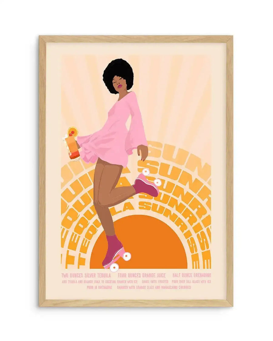 Art print featuring a retro-inspired illustration of a woman in a pink dress and roller skates, holding a cocktail, against a background of a stylized orange sunburst. The text "TEQUILA SUNRISE" is integrated into the sunburst design. Below the illustration, the cocktail recipe is detailed in white text. The print is displayed in a natural oak frame with a white border.