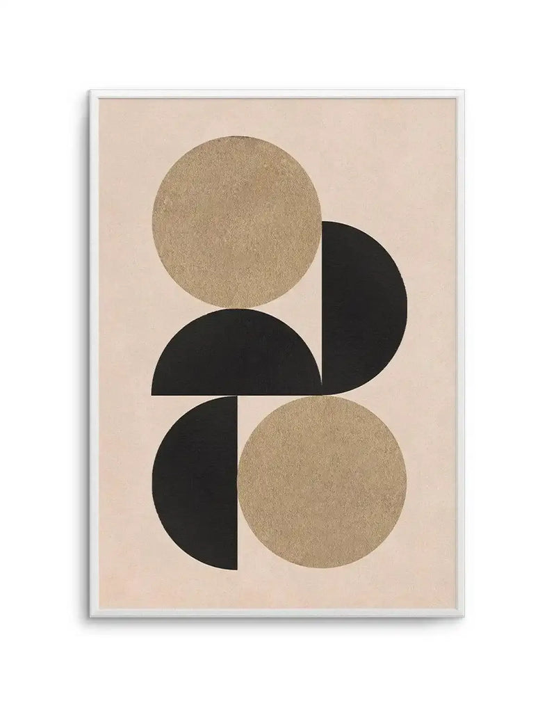 Abstract art print featuring a minimalist composition of geometric shapes in black and metallic gold on a pale beige background, displayed in a white frame with a white border. The design includes a large gold circle at the top, a black semi-circle below it, a black quarter-circle to its right, and a large gold circle at the bottom with a black quarter-circle to its left.