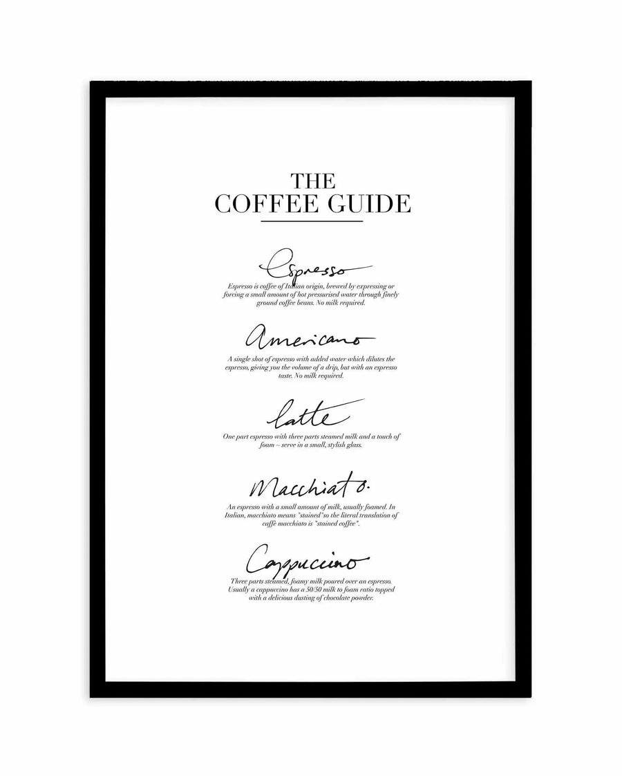 Art print featuring a black and white coffee guide with five different coffee types and their descriptions, printed on fine art paper and displayed in a black frame with a white border. The title "THE COFFEE GUIDE" is in a classic serif font, followed by "Espresso", "Americano", "Latte", "Macchiato", and "Cappuccino" in a flowing script font, each with a detailed description below in a smaller serif font.