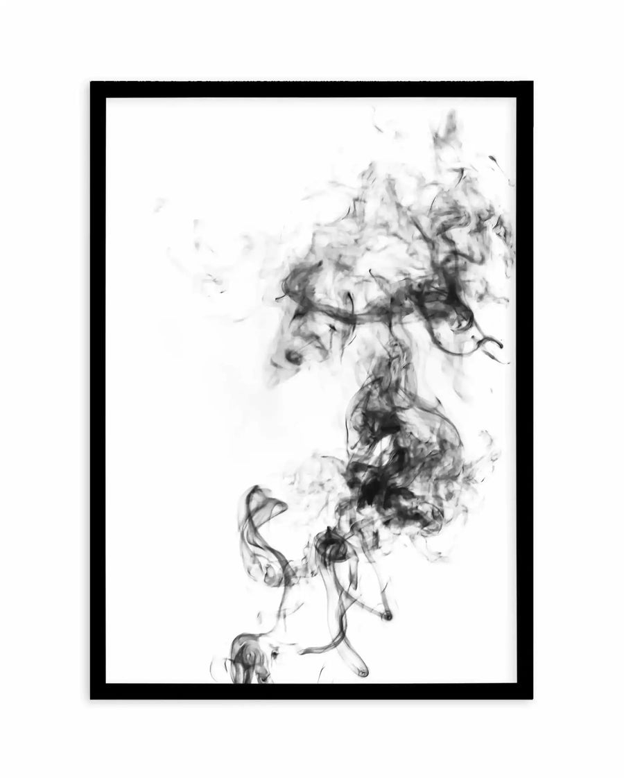 Black framed art print featuring an abstract monochromatic ink or charcoal composition. Swirling, wispy smoke-like forms in varying shades of gray and black drift upward from the bottom center, creating a vertical flow across a white background. The gestural marks suggest movement and ethereal quality, with darker concentrations in the middle dispersing into lighter, more diffuse strokes toward the edges. The print has a white border within the black frame.