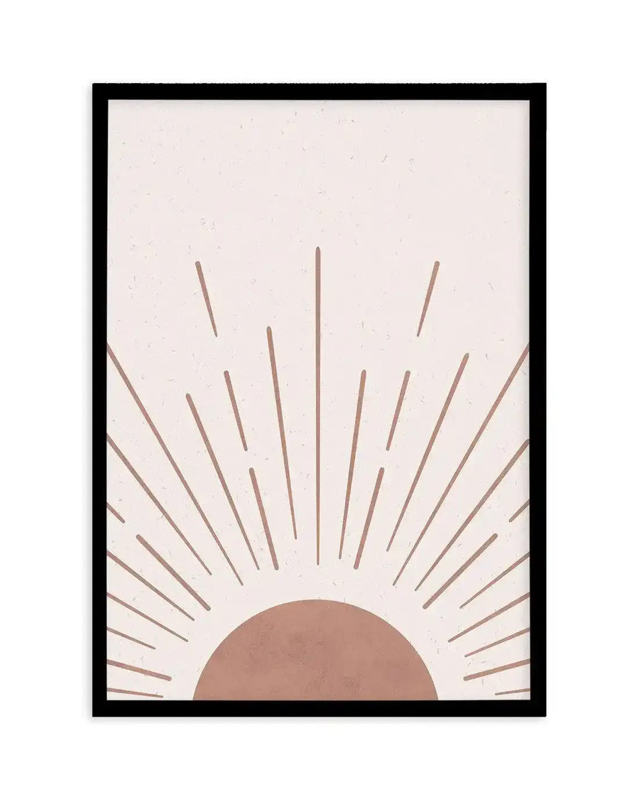 Abstract art print featuring a half-circle in a warm terracotta hue at the bottom, with radiating lines of varying lengths and thicknesses extending upwards from it, against a speckled pale cream background. The print is displayed in a black frame with a white border.