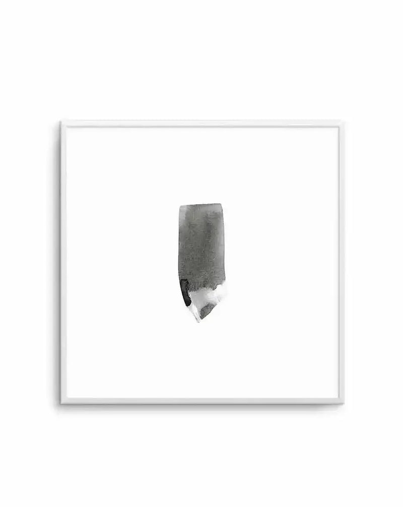 Abstract watercolour stroke art print in a white square frame with white border. The composition features a vertical brushstroke in shades of grey and black with soft, diffused edges characteristic of watercolour medium. The stroke appears organic and gestural, positioned slightly off-center against a clean white background. The frame is simple and contemporary with a thin silver-grey edge.