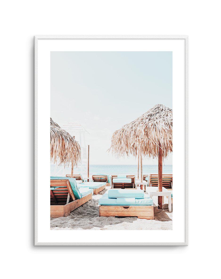 Aqua Sunlounges Art Print-Shop Greece Wall Art Prints Online with Olive et Oriel - Our collection of Greek Islands art prints offer unique wall art including blue domes of Santorini in Oia, mediterranean sea prints and incredible posters from Milos and other Greece landscape photography - this collection will add mediterranean blue to your home, perfect for updating the walls in coastal, beach house style. There is Greece art on canvas and extra large wall art with fast, free shipping across Aus