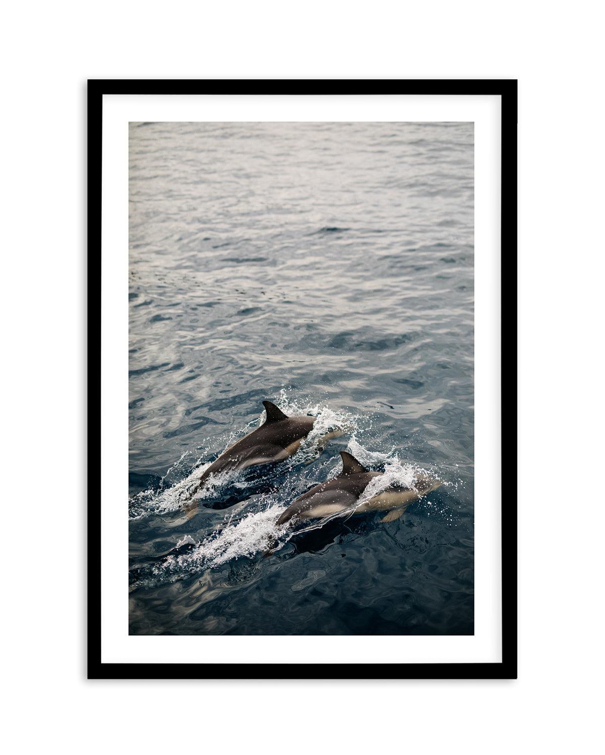 Dolphins in Antiparos, Greece by Jovani Demetrie Art Print-Shop Greece Wall Art Prints Online with Olive et Oriel - Our collection of Greek Islands art prints offer unique wall art including blue domes of Santorini in Oia, mediterranean sea prints and incredible posters from Milos and other Greece landscape photography - this collection will add mediterranean blue to your home, perfect for updating the walls in coastal, beach house style. There is Greece art on canvas and extra large wall art wi