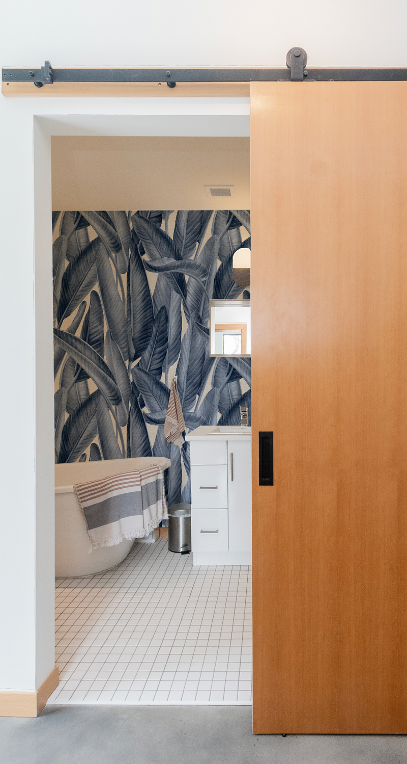 Gold Coast Palm Navy Blue Wallpaper from Olive et Oriel where you can shop wallpaper and artworks online