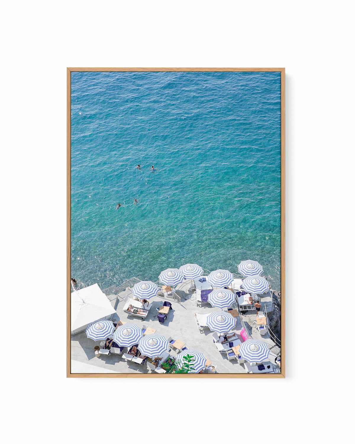 Umbrellas to Sea by Kamalia Studio | Framed Canvas Art Print